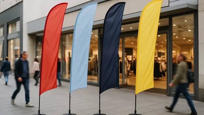 flagi-reklamowe-przed-sklepem flagi reklamowe przed wejściem do sklepu zwiększające widoczność firmy